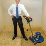 Chip Grimes demonstrating tile cleaning service